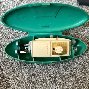 Old singer handheld sewing machine